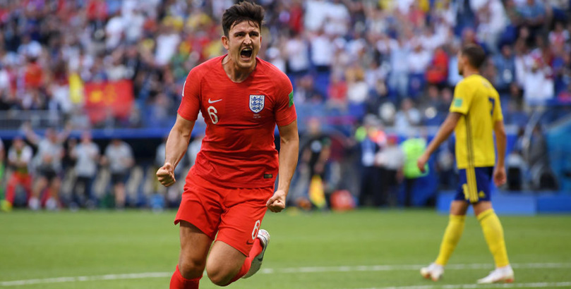 Harry Maguire celebrates scoring for England