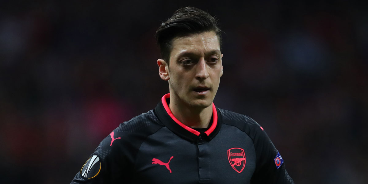 Lauren says Mesut Ozil must fight for his place at Arsenal