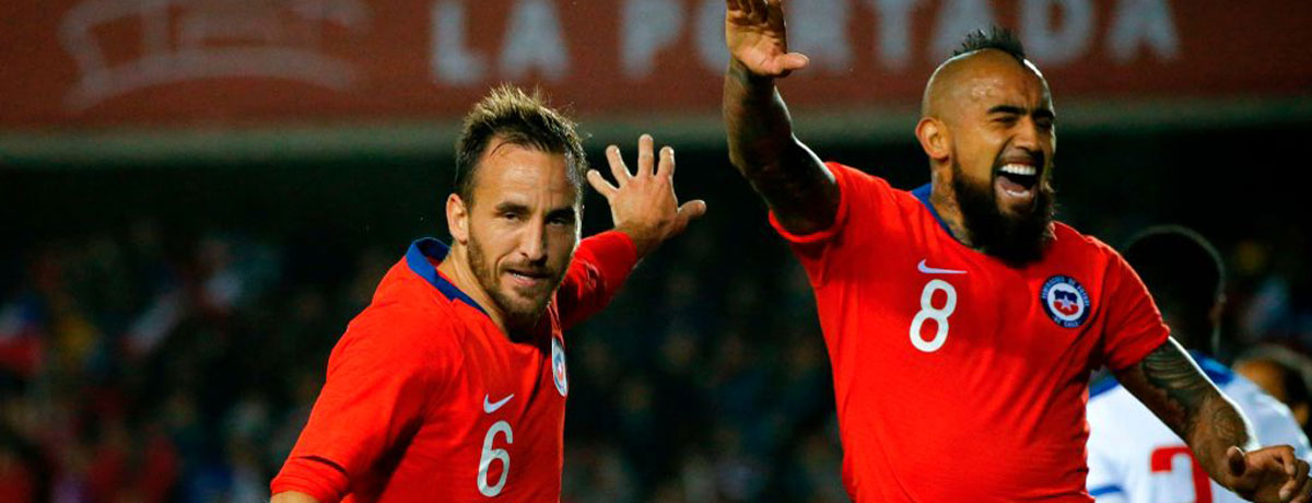 Chile players celebrate a goal