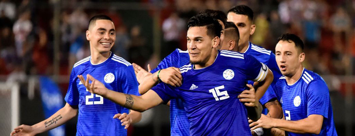 Paraguay players celebrate a goal