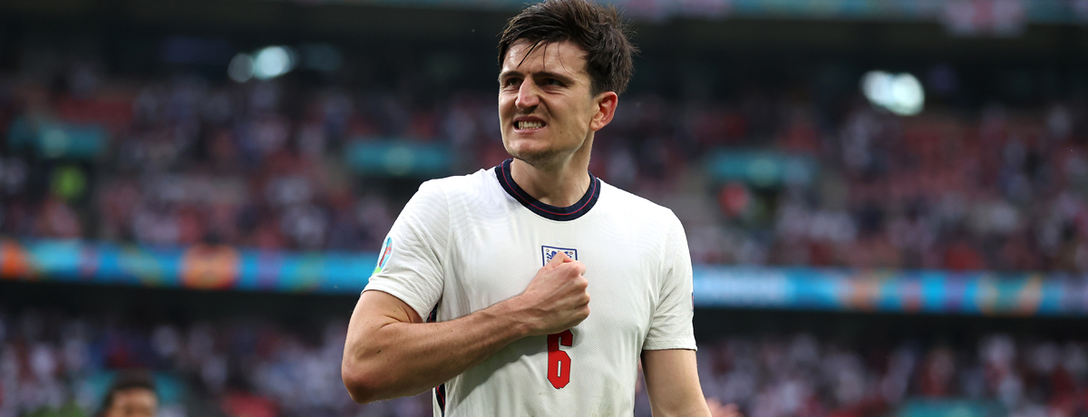 Harry Maguire celebrates scoring for England